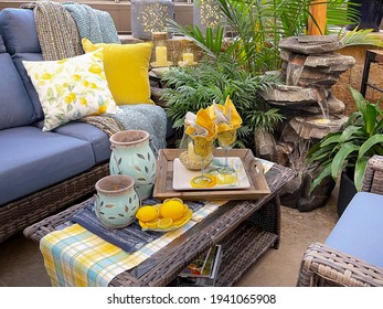 Outdoor Living Space Decorated For Spring. Water Fountain For Relaxation 