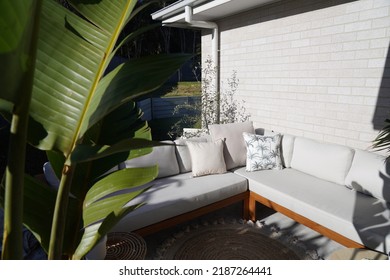 Outdoor Lounge Decor, Coastal Boho Lounge Styling, Coastal outdoor cosy lounge dining set up. Coastal Bohemian Styling Decor. - Shutterstock ID 2187264441