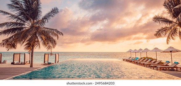 Outdoor luxury sunset over infinity pool swimming summer beachfront hotel resort, tropical landscape. Beautiful tranquil beach tourism panoramic vacation. Amazing island sunset beach view, palm trees - Powered by Shutterstock