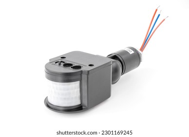 outdoor motion sensor, detector for home security or lighting system, on isolated white - Shutterstock ID 2301169245