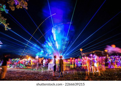 Outdoor night music party with laser lights and fire summer - Shutterstock ID 2266639215