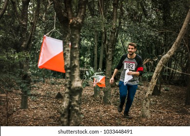 Outdoor orienteering check point activity - Shutterstock ID 1033448491