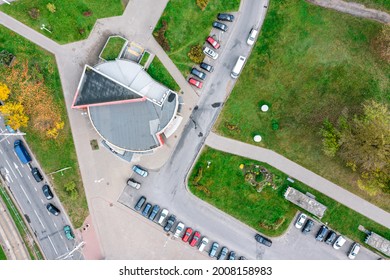 Outdoor Parking Lot With Parked Cars. Aerial Drone Photo Looking Down