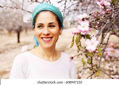 Outdoor portrait of 40 years old woman