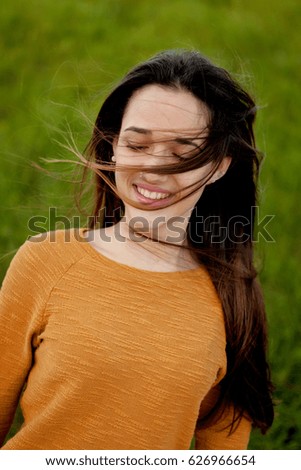 Similar – Outdoor portrait of beautiful happy teenager girl