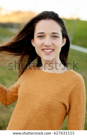 Similar – Outdoor portrait of beautiful happy teenager girl