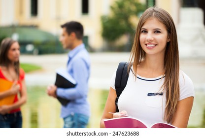 Outdoor Portrait Of A Beautiful Smiling Student