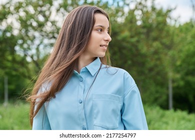 Outdoor portrait of a beautiful teenage girl 15 years old