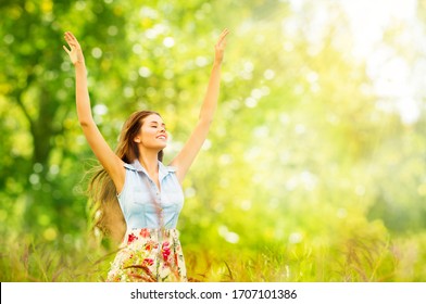 Outdoor Portrait of Beautiful Young Woman in Nature. Happy Girl Raised Arms Up in Summer Green Park