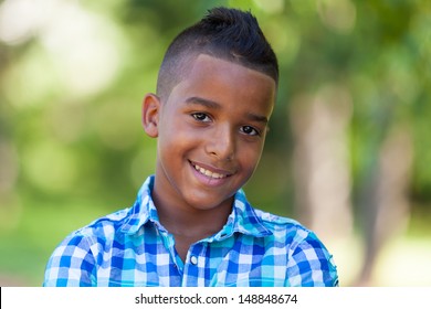 Outdoor Portrait Of A Cute Teenage Black Boy - African People