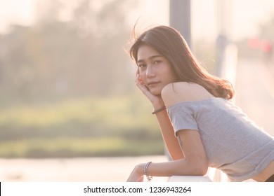 Outdoor portrait of a cute young Asian woman - Shutterstock ID 1236943264
