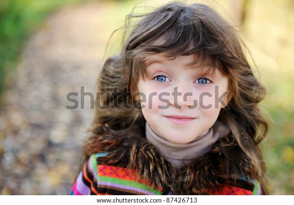 Outdoor Portrait Funky Little Girl Unfastened Stock Photo