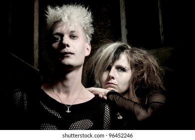 Outdoor Portrait Of A Goth Punk Couple