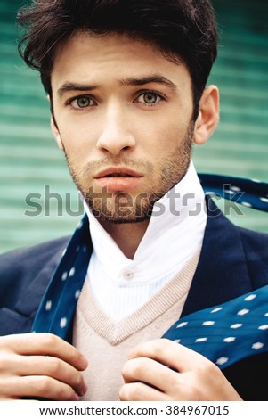 Similar – Guy with beard and modern hairstyle in the street.