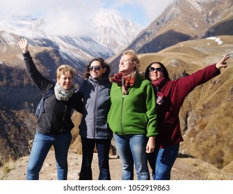 Outdoor Portrait Of Happy 45 Years Old Woman Traveling Together