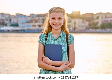 Outdoor Portrait Of A Schoolgirl Child 10, 11 Years Old.