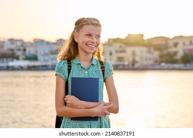 Outdoor Portrait Of A Schoolgirl Child 10, 11 Years Old.