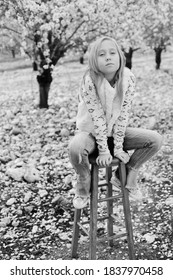 Outdoor Portrait Of A Serious 10 Year Old Girl