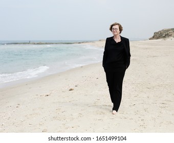 Outdoor Portrait Of A Serious 40 Year Old Woman 