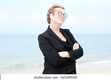 Outdoor Portrait Of A Serious 40 Year Old Woman 