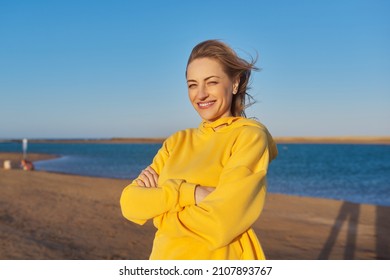 Outdoor Portrait Of A Smiling Confident Woman 45 Years Old.