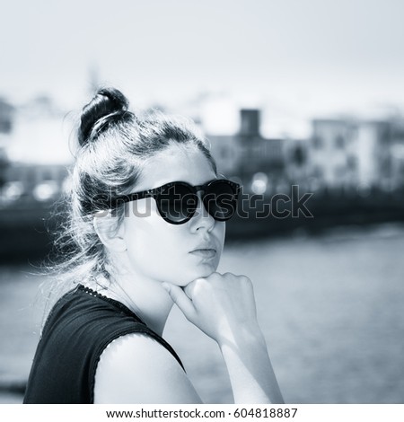 Similar – Portrait von einer jungen Frau mit Wind im Haar