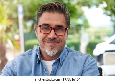 Outdoor Portrait Of White Older Man With Gray Hair, Wearing Eyewear.