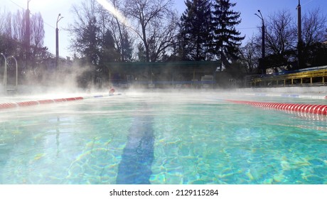 Outdoor Public Swimming Pool In Sunny Day