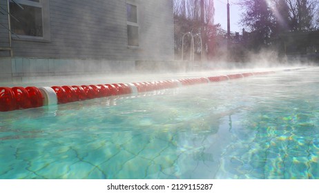 Outdoor Public Swimming Pool In Sunny Day