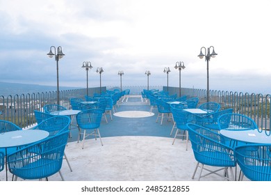 Outdoor restaurant coffee open air cafe chairs with table. Summer vacation on resort - Powered by Shutterstock