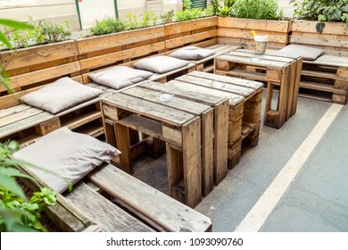 Outdoor Restaurant Sitting Area Made Of Old Palette Wood