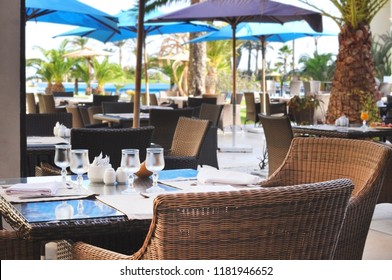 Outdoor Restaurant Under Palm Trees And Umbrellas.Tunis, Monastir