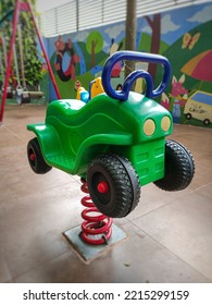 Outdoor Rocking Toy For Children. Plastic Car Rocking Spring In The Playground. No People