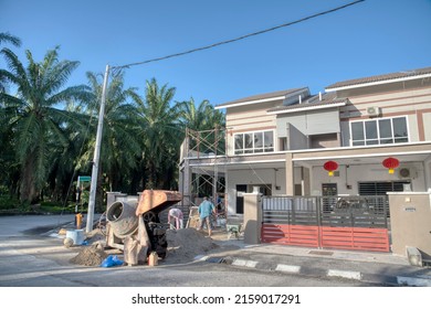 Outdoor Scene Of The Double Storey Suburb Home.