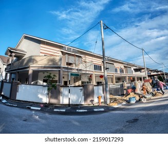 Outdoor Scene Of The Double Storey Suburb Home.