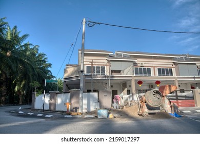 Outdoor Scene Of The Double Storey Suburb Home.