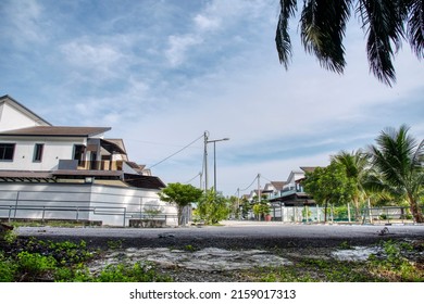 Outdoor Scene Of The Double Storey Suburb Home.