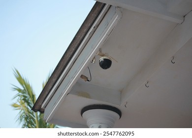 Outdoor Security Camera Installed on a Building for Surveillance and Monitoring