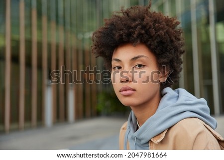 Similar – Image, Stock Photo Young african american woman web-surfing internet