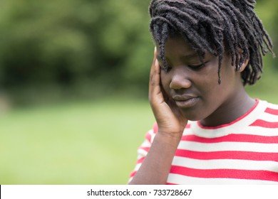 Outdoor Shot Of Stressed Teenage Girl 