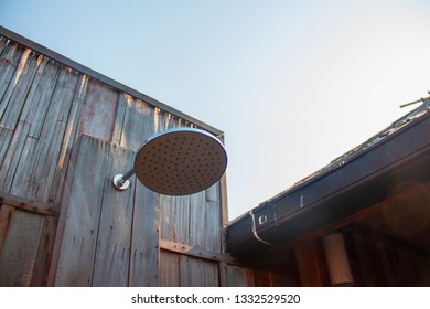 Outdoor Shower With A Large Shower In The Bathroom Made From Wooden Wall For Tourists To Steep A Shower After The Tour.