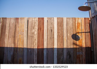 Outdoor Shower With A Large Shower In The Bathroom Made From Wooden Wall For Tourists To Steep A Shower After The Tour.