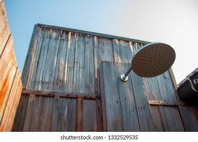 Outdoor Shower With A Large Shower In The Bathroom Made From Wooden Wall For Tourists To Steep A Shower After The Tour.