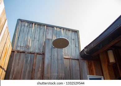 Outdoor Shower With A Large Shower In The Bathroom Made From Wooden Wall For Tourists To Steep A Shower After The Tour.