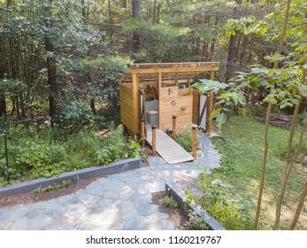 An Outdoor Shower Stall At A Glamping Site