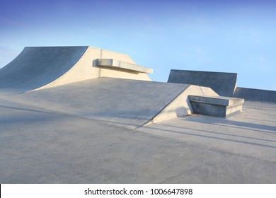 Outdoor Skatepark With Blue Sky And Grey Concerete In Harwich, Essex, Uk