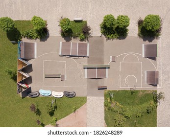 Outdoor skatepark with various ramps. urban sports ground. aerial top view