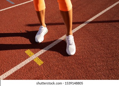 Outdoor Sports Clothing And Shoes, Urban Style. Sneakers Closeup. Summer Morning Workout. No Face.