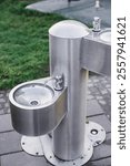 Outdoor stainless steel water drinker in park