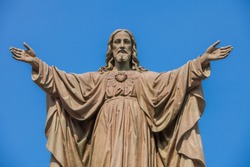 Outdoor Statue Of Jesus With Open Arms
